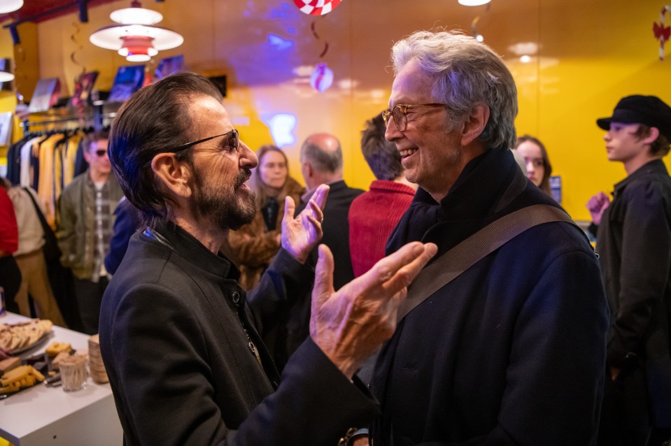 Ringo chatting to Eric Clapton at his launch