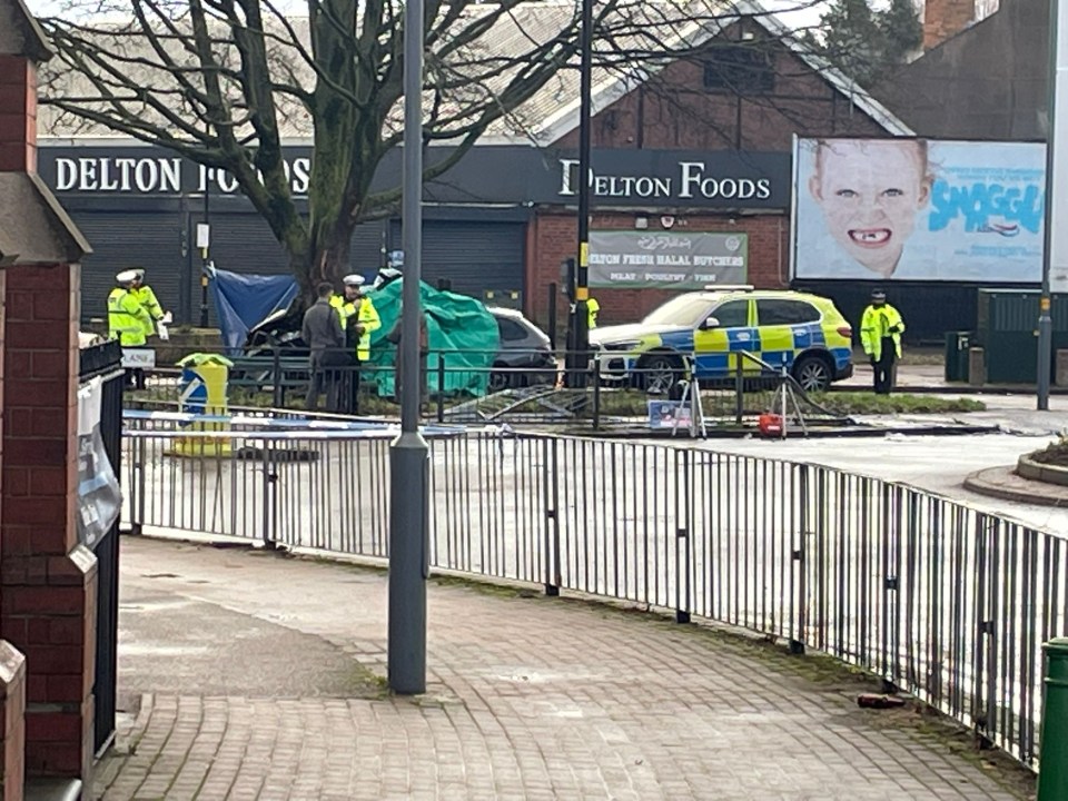 Police at a crime scene in Church Lane, Birmingham, where a teenager died and four others were injured.