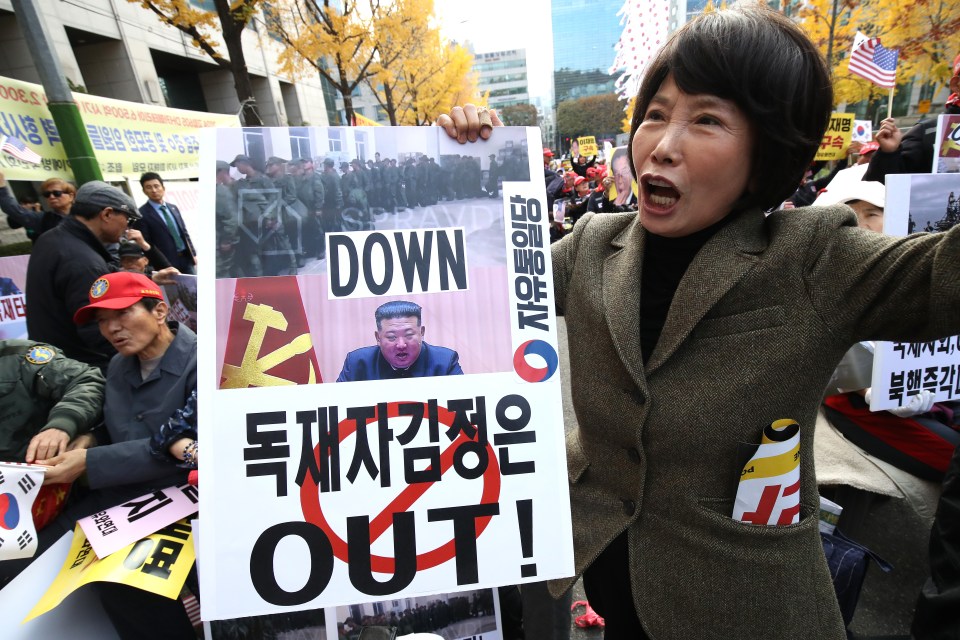 Protestors in Seoul demonstrate against North Korea and its leader.