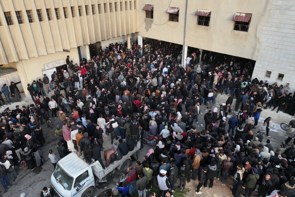 Many gathered outside the tyrant’s death camp prisons, such as Saydnaya, waiting for news of loved ones