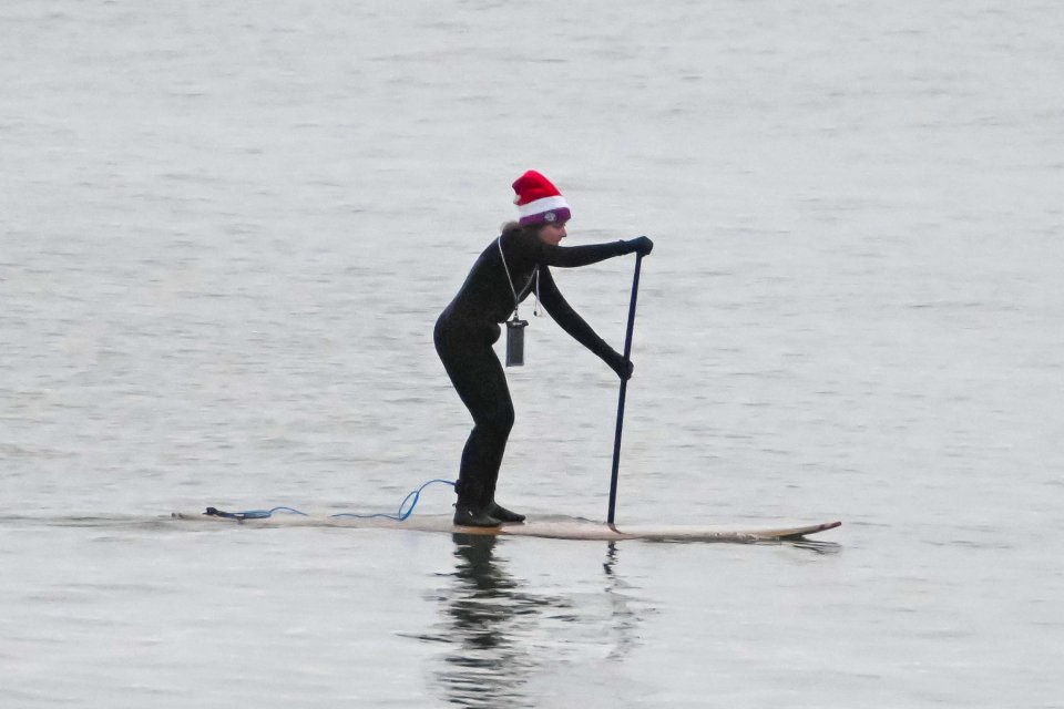 The paddle boarder has the luxury of a calm sea at Avon Beach