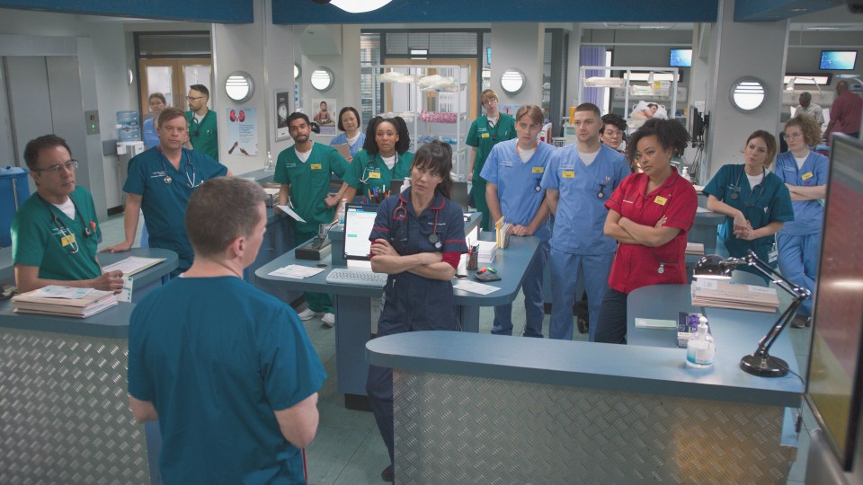 Hospital staff gathered for a briefing.