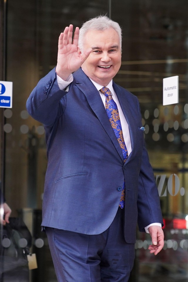 Eamonn Holmes waving goodbye outside GB News offices.