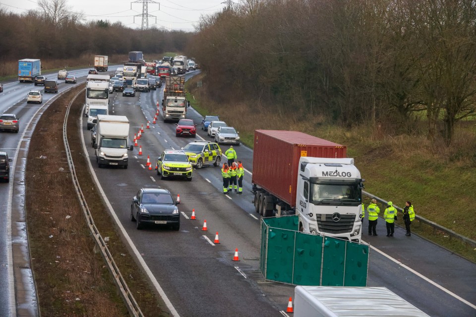 Police officers and emergency services are present at the scene