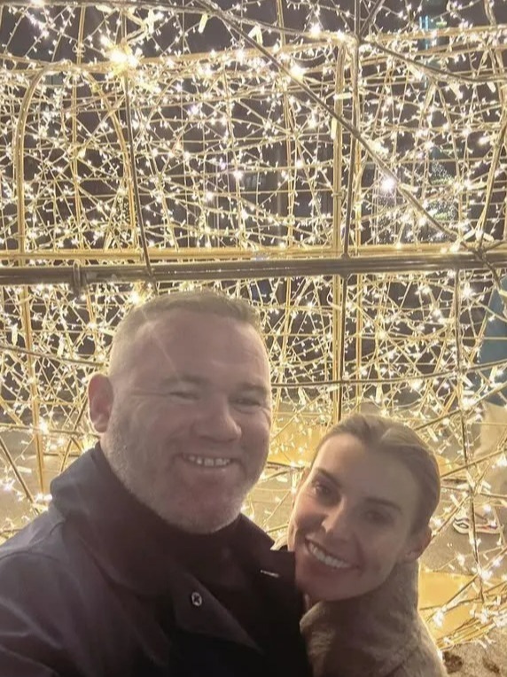 Wayne Rooney looked ecstatic to have wife Coleen back