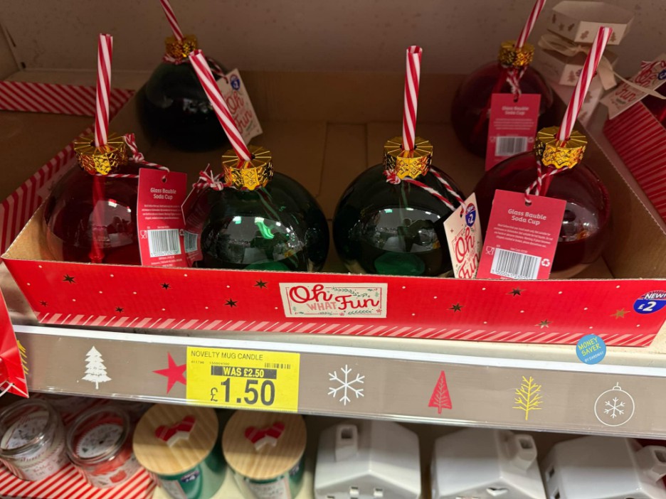 Christmas bauble-shaped soda cups with straws.