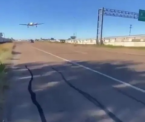 Moments before the crash the plane can be seen approaching the road attempting an emergency landing