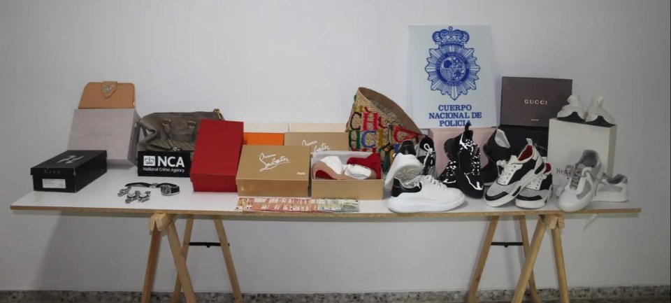 Seized high-value items including designer handbags, shoes, and watches.