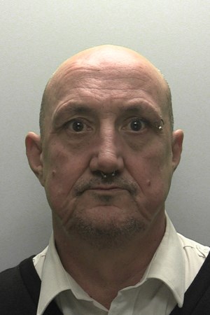 Mugshot of a 54-year-old former Plymouth bus driver.