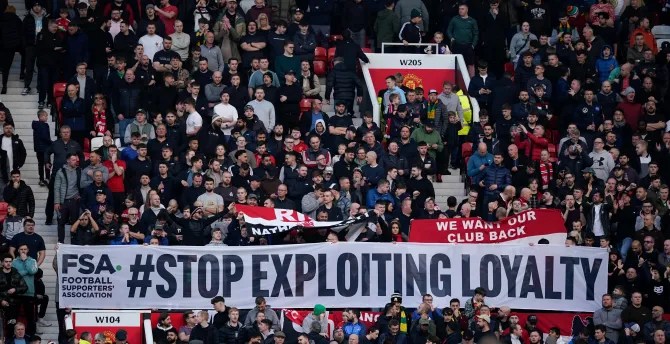 A banner saying 'Stop Exploiting Loyalty' was held up inside and outside Old Trafford last week