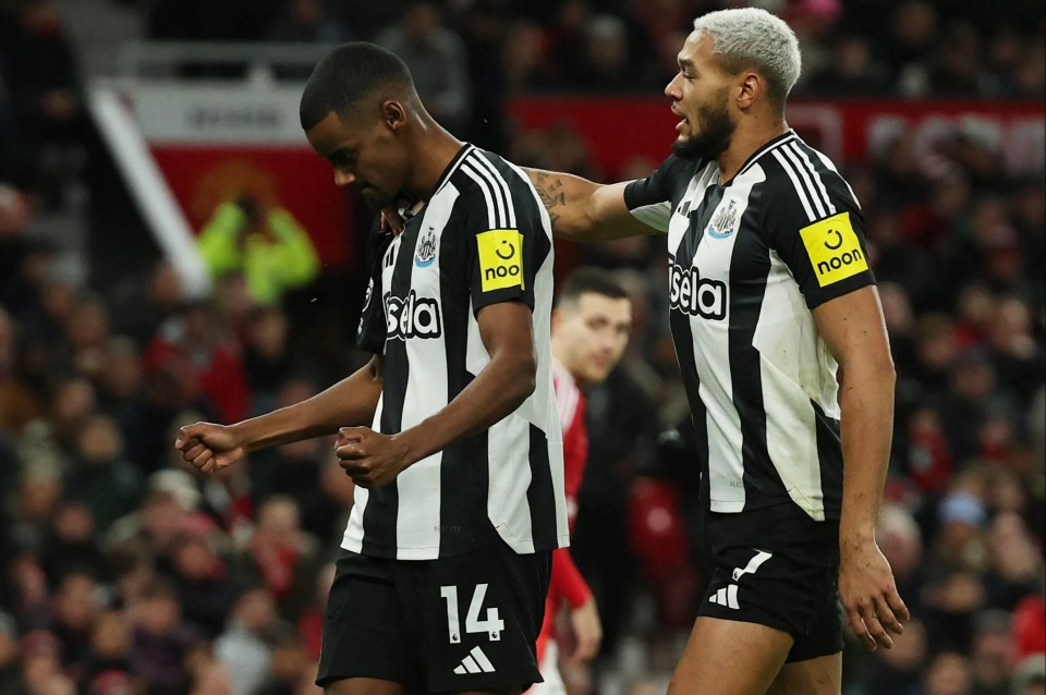 Alexander Isak and Joelinton of Newcastle United celebrate a goal.