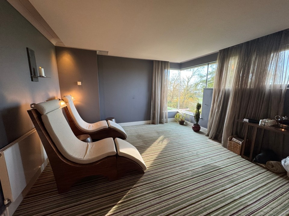 Two comfortable lounge chairs in a relaxation room.