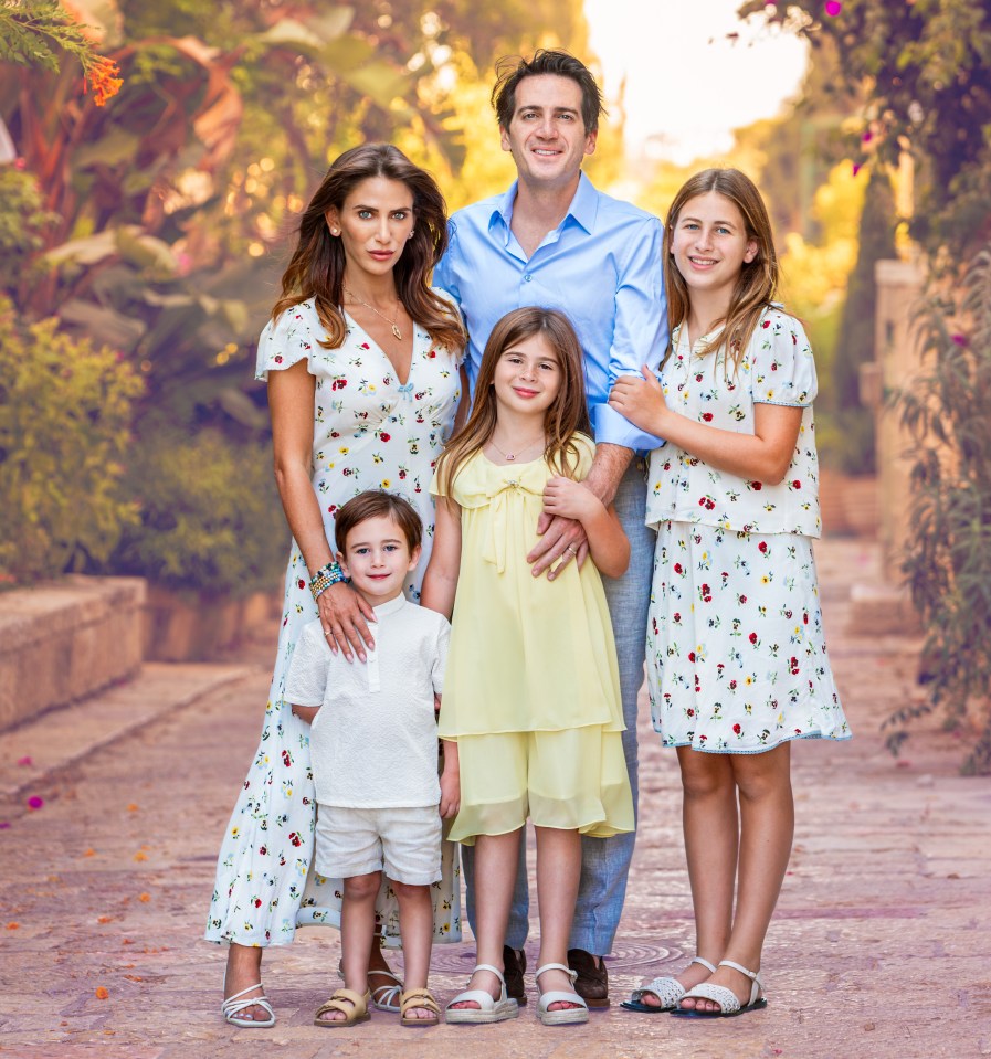 Family portrait in a garden.