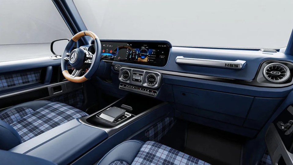 Interior of a blue and wood-trimmed G-Wagon, a tribute to Sir Stirling Moss.