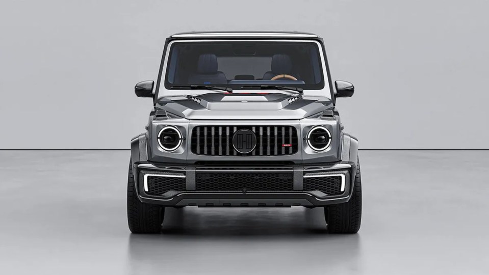 Front view of a silver custom-made G-Wagon SUV, number 722 on the hood.