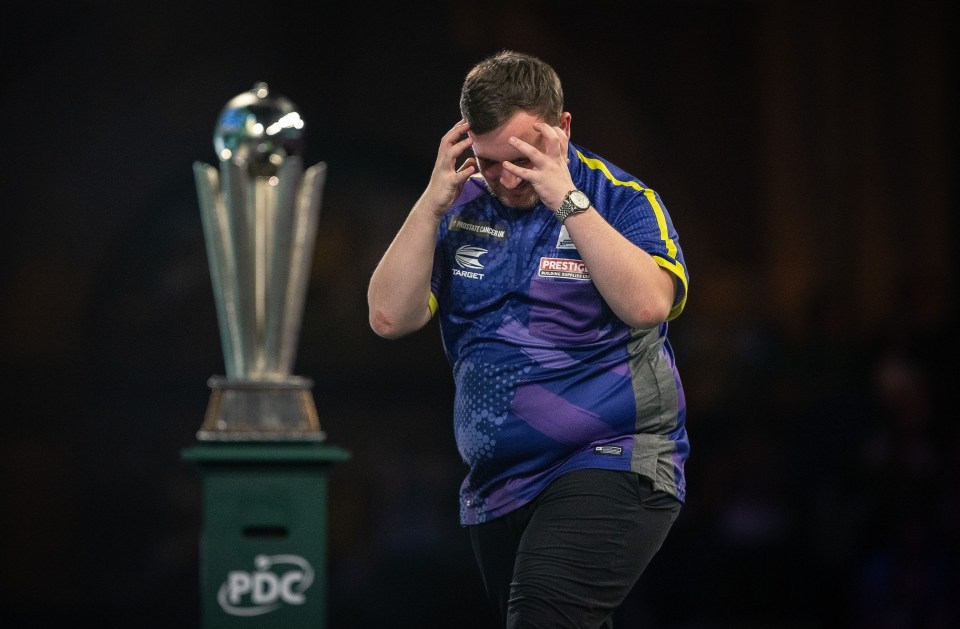 Luke Littler reacting during the 2024 Paddy Power Darts World Championship final.