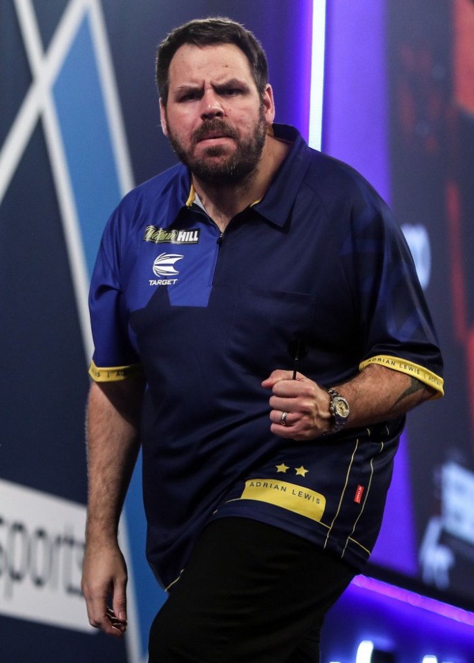 Adrian Lewis celebrates after hitting a 180 during day eight of the William Hill World Darts Championship at Alexandra Palace, London. PA Photo. Picture date: Tuesday December 22, 2020. See PA story DARTS World. Photo credit should read: Kieran Cleeves/PA Wire. RESTRICTIONS: Use subject to restrictions. Editorial use only, no commercial use without prior consent from rights holder.