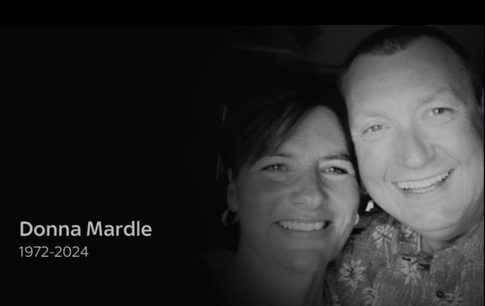 Black and white photo of Donna Mardle with a man.