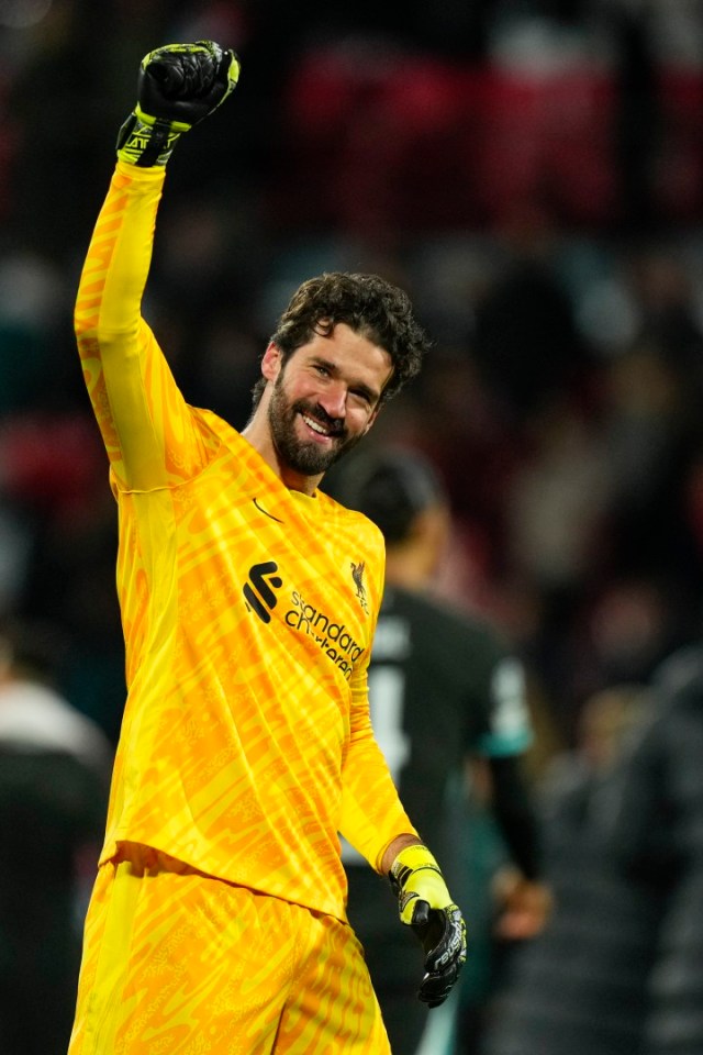 epa11769250 Liverpool's goalkeeper Alisson Becker greets supporters after winning the UEFA Champions League soccer match between Girona FC and Liverpool FC, in Girona, Spain, 10 December 2024. EPA/Siu Wu