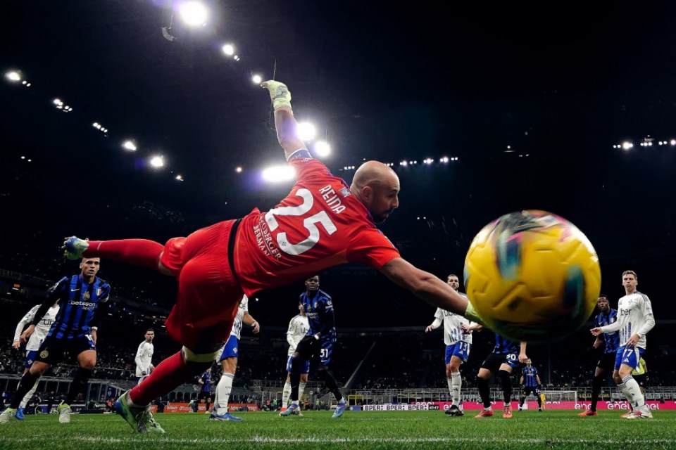 MILAN, ITALY - DECEMBER 23: (EDITORS NOTE: In this photo taken from a remote camera from inside the goal) Carlos Augusto of FC Internazionale scores his team's a first goal during the Serie match between Inter and Como at Stadio Giuseppe Meazza on December 23, 2024 in Milan, Italy. (Photo by Mattia Ozbot - Inter/Inter via Getty Images)