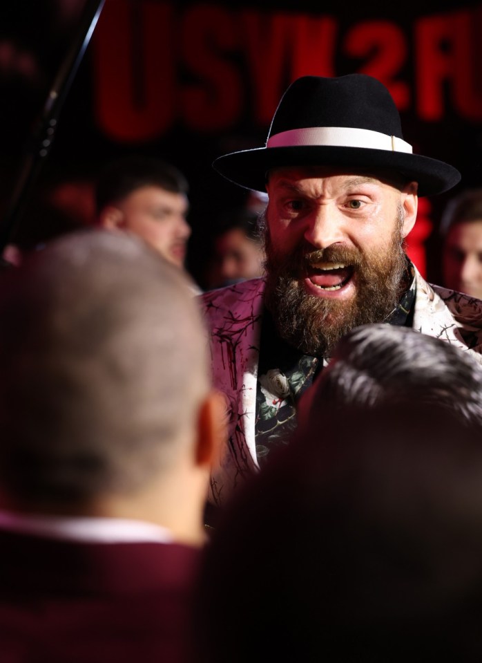 RIYADH, SAUDI ARABIA - DECEMBER 19: Oleksandr Usyk (left) and Tyson Fury face off during a press conference as part of Oleksandr Usyk v Tyson Fury 2 at Via Riyadh on December 19, 2024 in Riyadh, Saudi Arabia. (Photo by Mark Robinson/Getty Images).