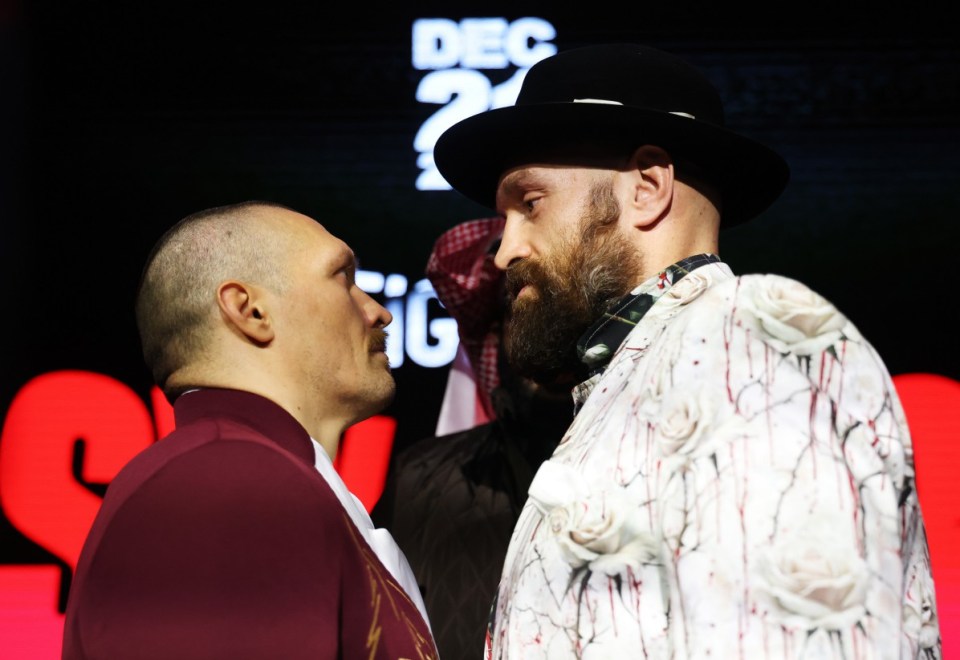 RIYADH, SAUDI ARABIA - DECEMBER 19: Tyson Fury (R) and Oleksandr Usyk face off ahead of the IBF, IBO, WBA, WBC and WBO Undisputed World Heavyweight Title fight between Oleksandr Usyk and Tyson Fury during a press conference as part of Oleksandr Usyk v Tyson Fury 2 at Via Riyadh on December 19, 2024 in Riyadh, Saudi Arabia. (Photo by Richard Pelham/Getty Images) *** BESTPIX ***