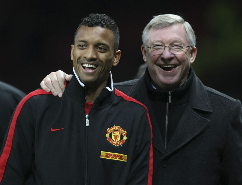 MANCHESTER, ENGLAND - DECEMBER 26: Sir Alex Ferguson of Manchester United speaks with Nani after the Barclays Premier League match between Manchester United and Wigan Athletic at Old Trafford on December 26, 2011 in Manchester, England. (Photo by John Peters/Manchester United via Getty Images)