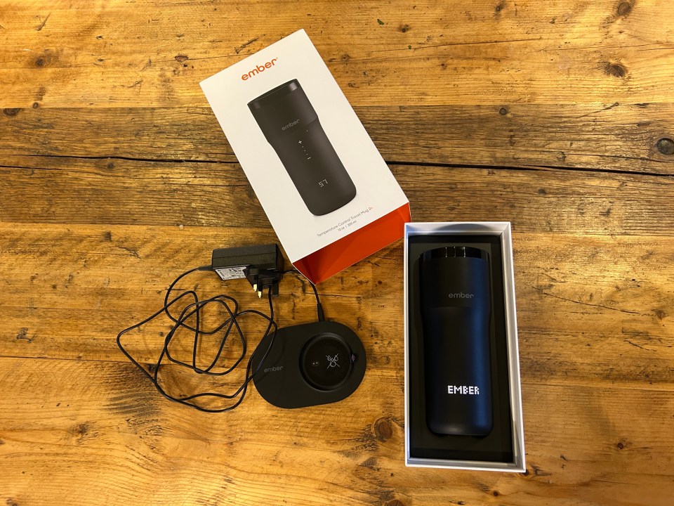 Ember temperature control travel mug with charger and box.