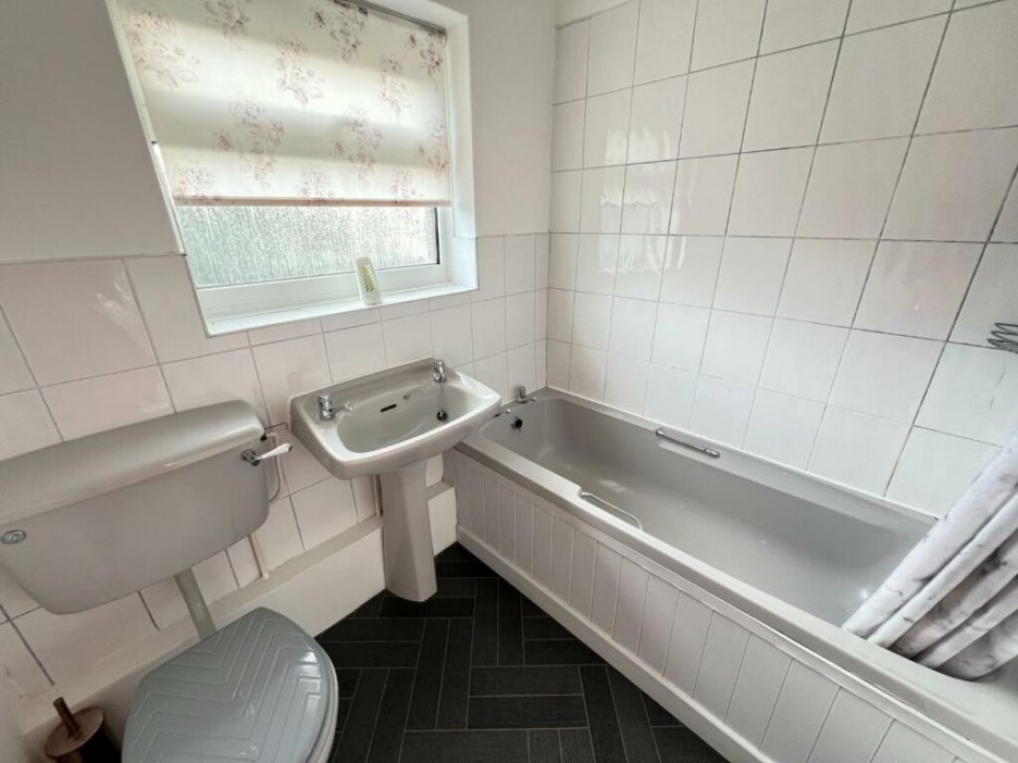 A bathroom also sits on the first floor