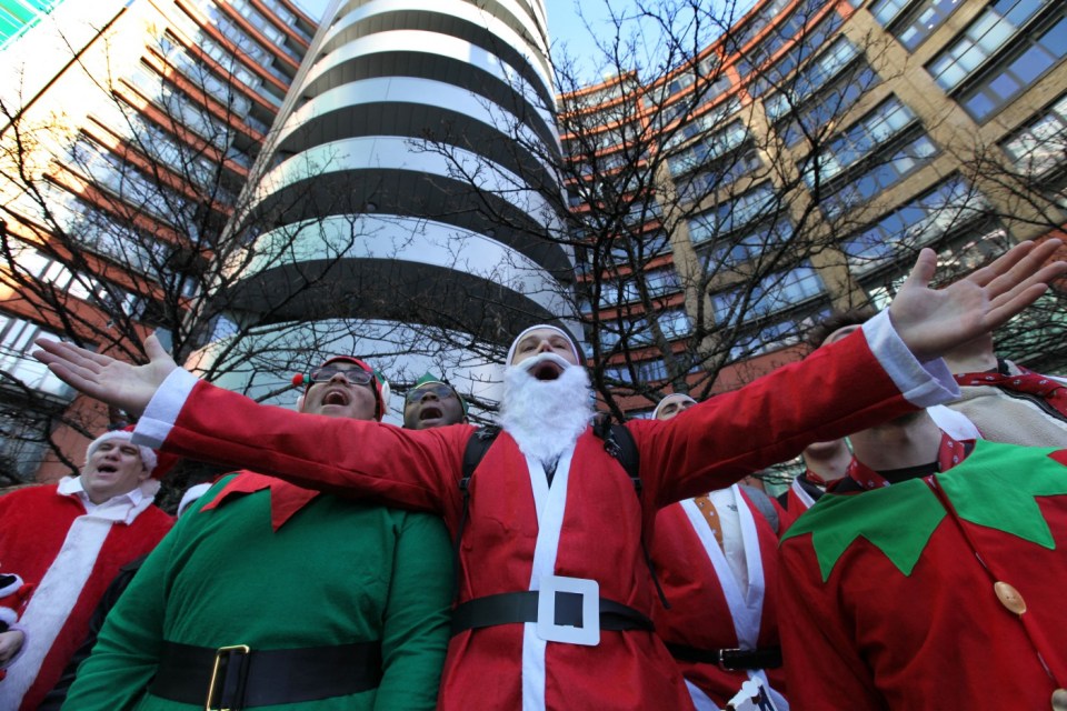 Revellers sang carols loud for everyone to hear in London on Saturday, December 14