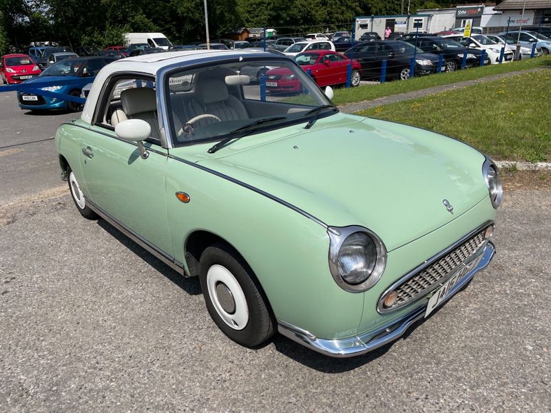 Light green convertible car.