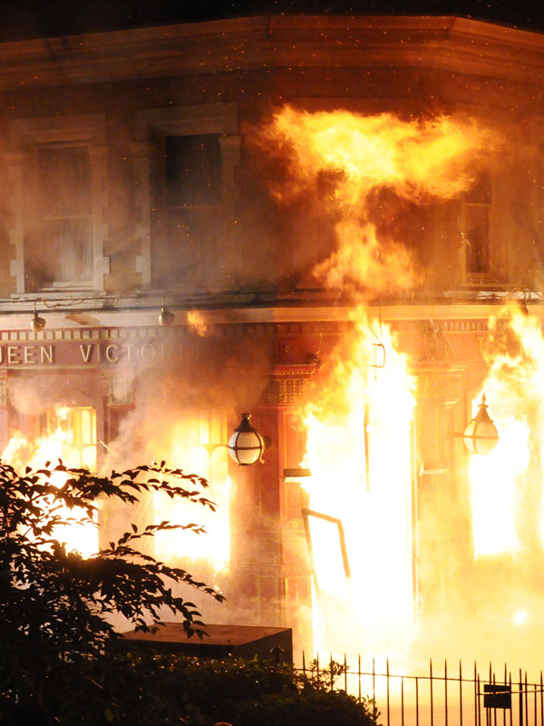 A large fire at the Queen Victoria public house in Walford, London.