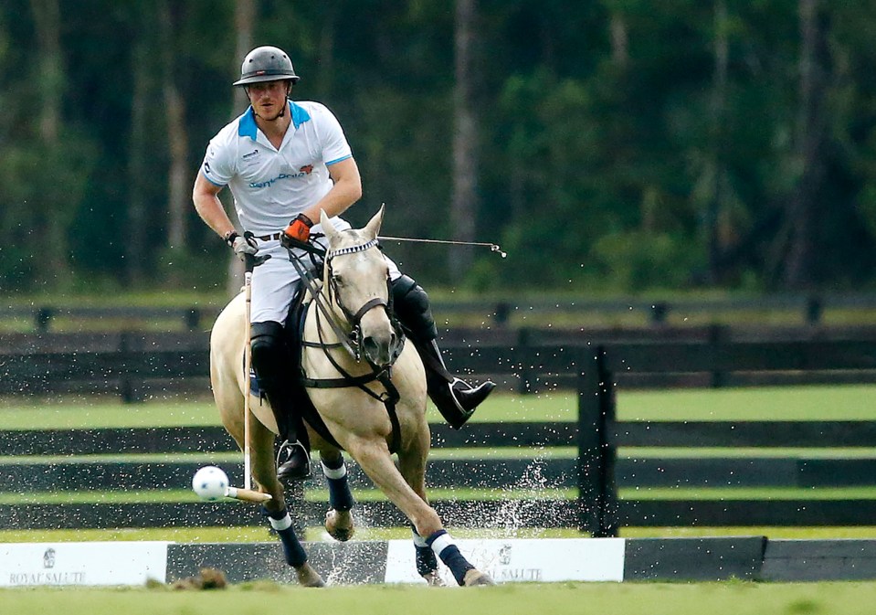 Prince Harry competes during the Sentebale Royal Salute Polo Cup 2016