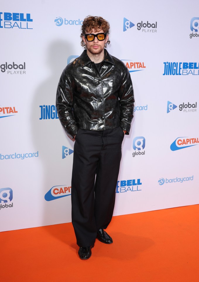 Tom Grennan donned an oversized patent jacket