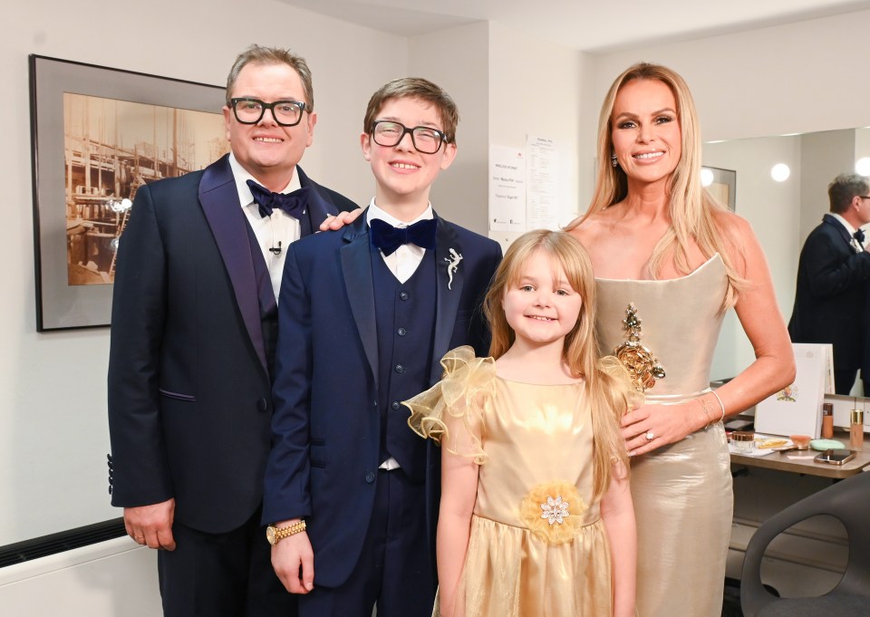 Alan Carr and Amanda Holden with mini-mes Oliver Savell and Isla Ashworth