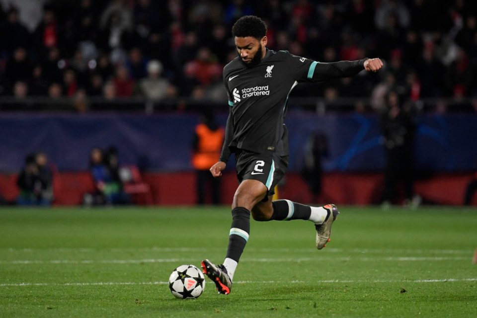 Liverpool's English defender #02 Joe Gomez shoots during the UEFA Champions League, league phase football match between Girona FC and Liverpool FC at the Montilivi stadium in Girona on December 10, 2024. (Photo by Josep LAGO / AFP) (Photo by JOSEP LAGO/AFP via Getty Images)