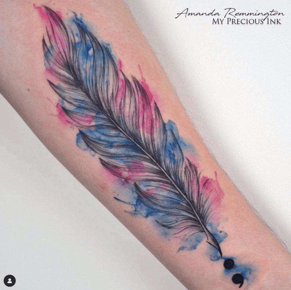 A feather with subtle trans colourings was Van Leuven's first tattoo