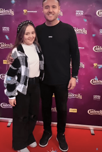 The actor and his girl on the red carpet at the panto