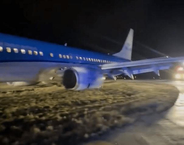 The KLM plane was left on the grass adjacent to the runway