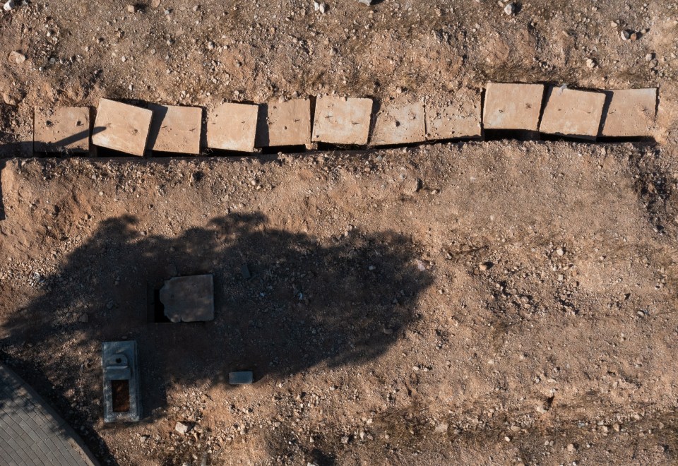 An aerial view of the Adra mass grave, where countless persecuted enemies of Assad were carelessly buried