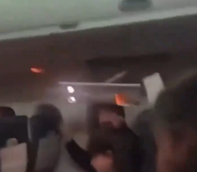 Passengers are thrown into chaos inside the aircraft