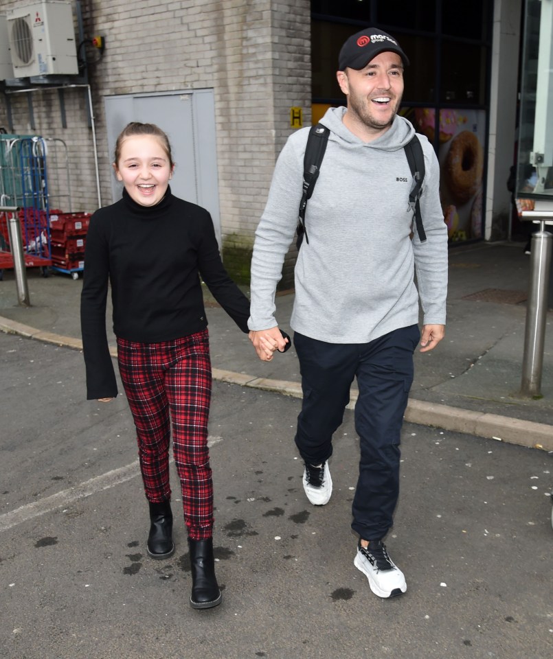 The delighted pair were reunited at Manchester Airport