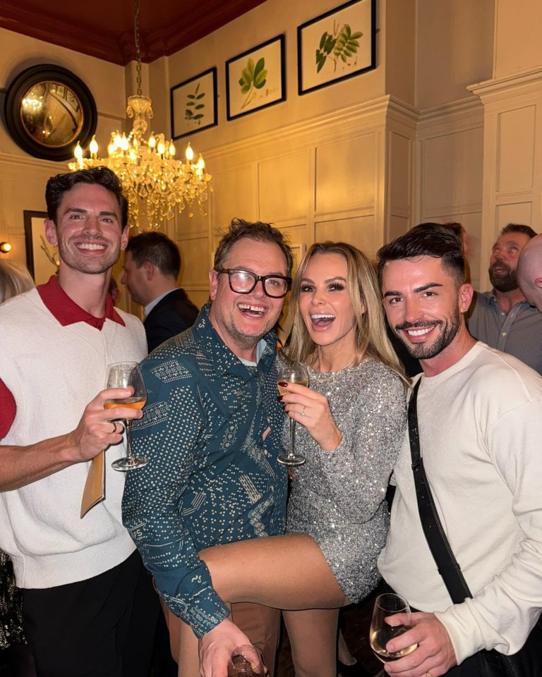 Amanda Holden and Alan Carr enjoyed a boozy Christmas bash together