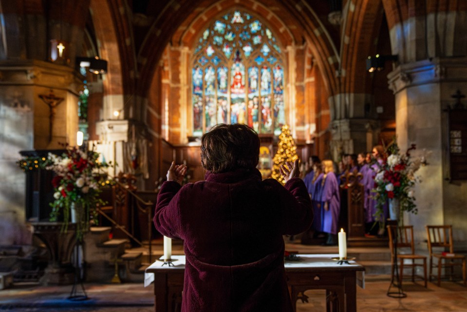 Yolande makes her way to church on Christmas Eve on the day of his burial