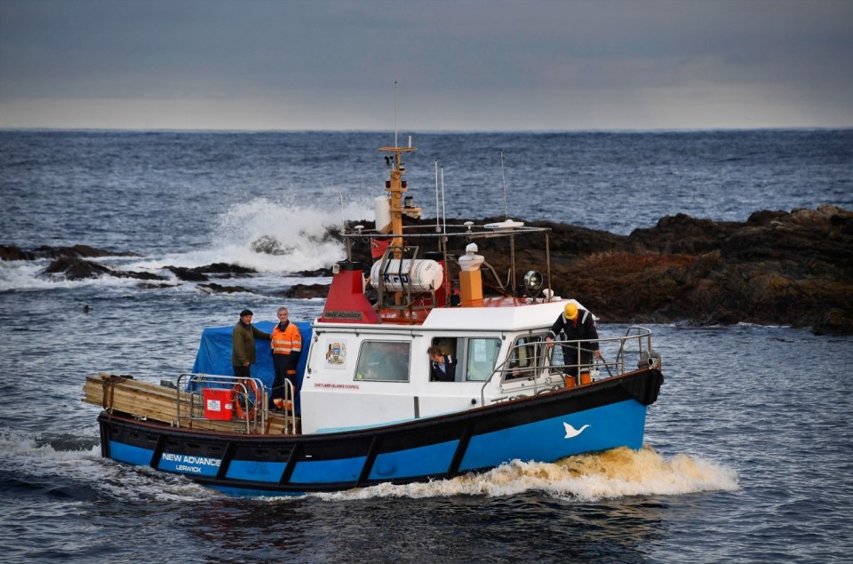 FOULA, SCOTLAND - OCTOBER 01: Foula residents arrive back at the island on the New Advance with supplies from Shetland on October 1, 2016 in Foula, Scotland. Foula is the remotest inhabited island in Great Britain with a current population of thirty people and has been owned since the turn of the 20th century by the Holbourn family. (Photo by Jeff J Mitchell/Getty Images)