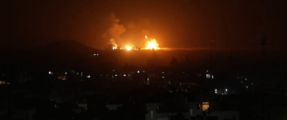 The moment explosions lit up the Syrian sky after Israel struck near the Qamishli airbase