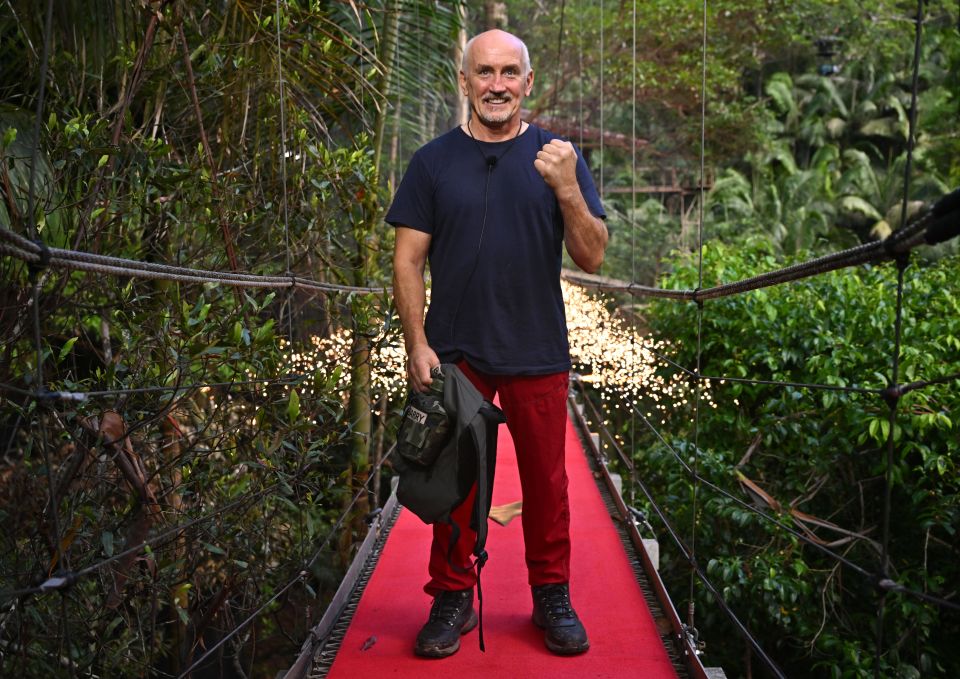 Dean pictured on the jungle bridge before being reunited with loved ones