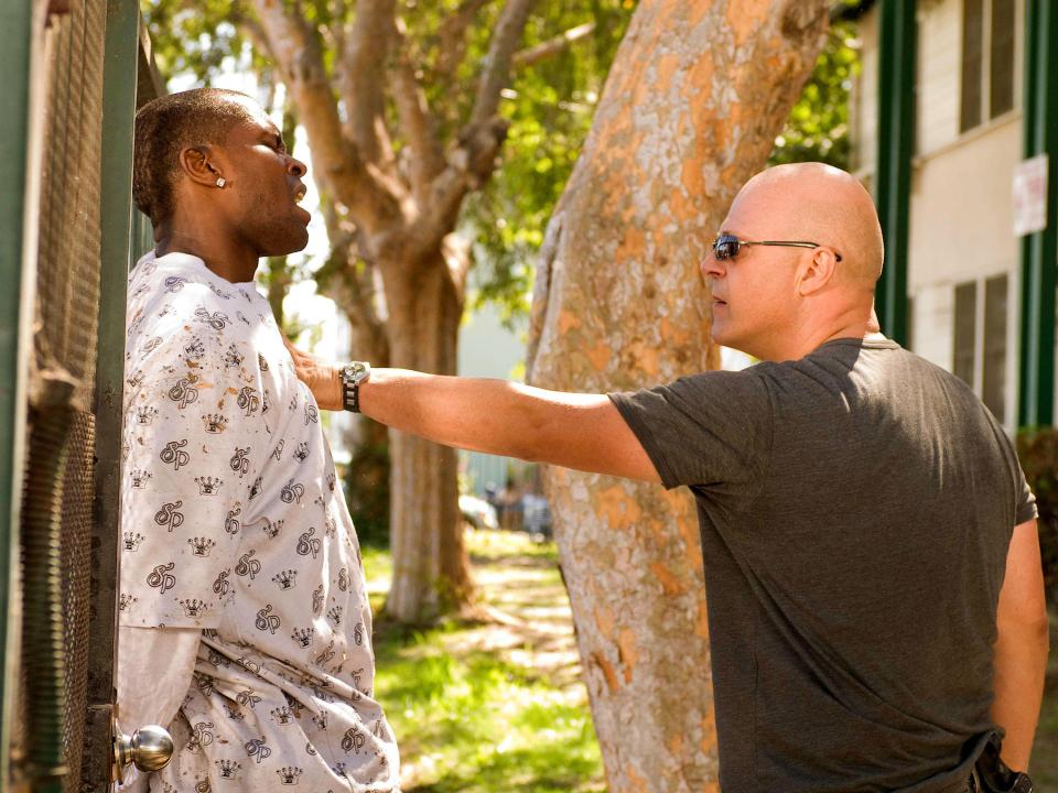 Michael Chiklis confronts a man in one of The Shield episodes.