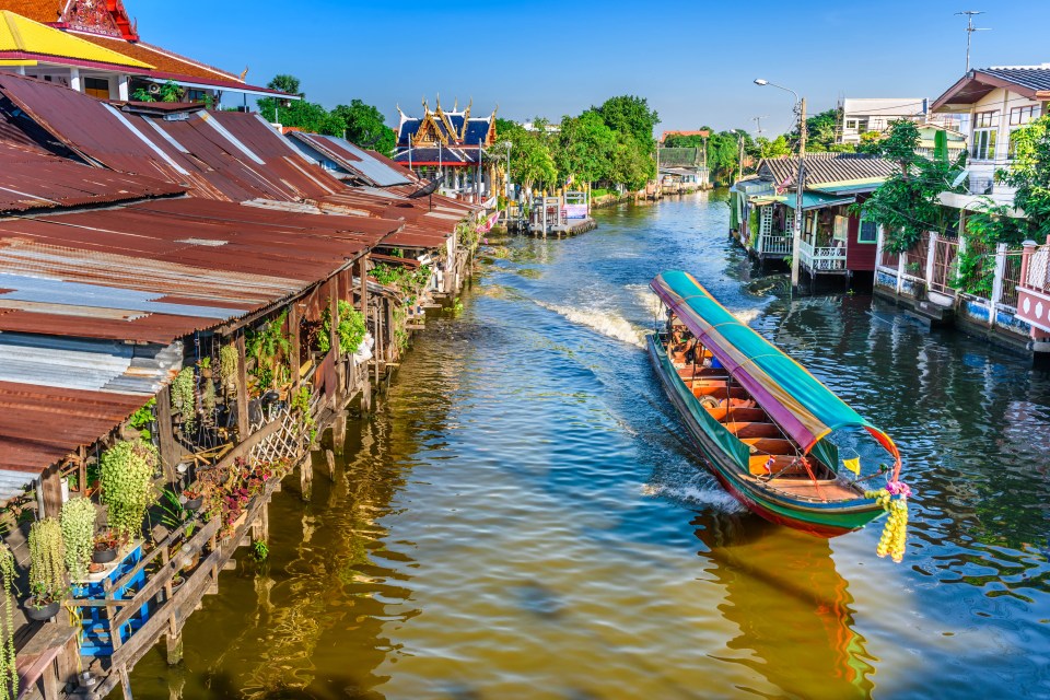 Longtail boat on Bangkok canal.