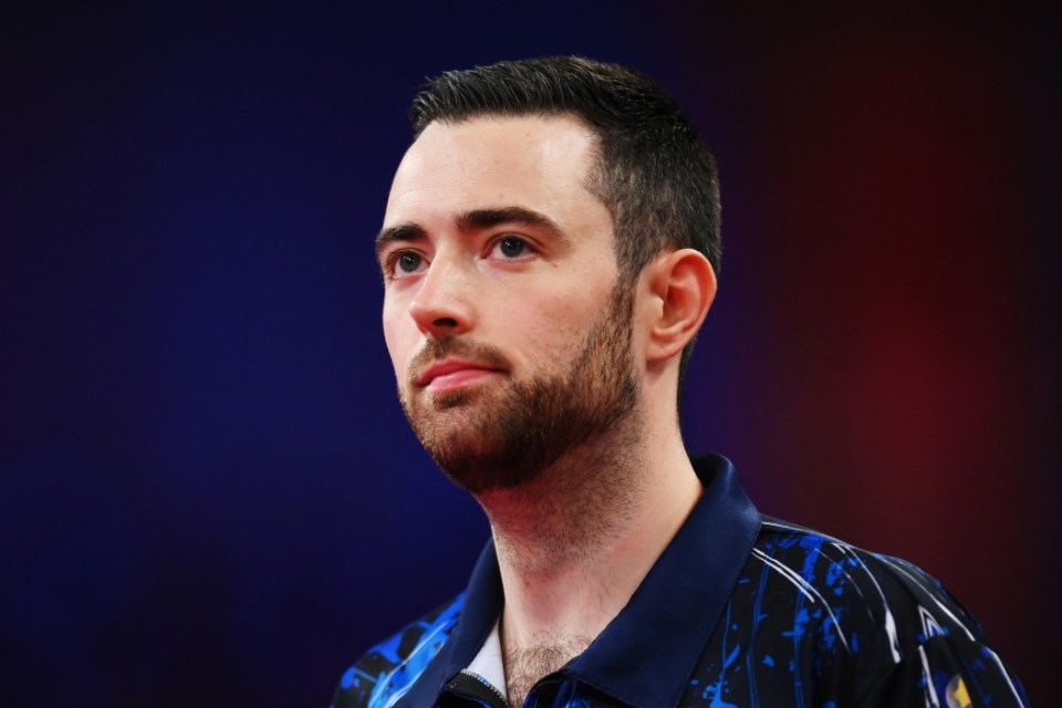 BLACKPOOL, ENGLAND - JULY 21: Luke Humphries of England  looks on against Michael Van Gerwen of Netherlands during the Final of the Men's 2024 Betfred World Matchplay Finals at Winter Gardens on July 21, 2024 in Blackpool, England. (Photo by Ben Roberts Photo/Getty Images)